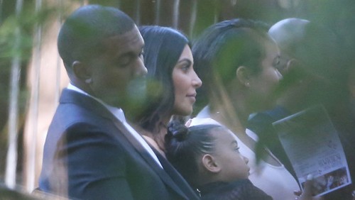 Kim Kardashian & Kanye West Cuddle At Friend Wedding With North West Kim Kardashian & Kanye West Cuddle At Friend Wedding With North West